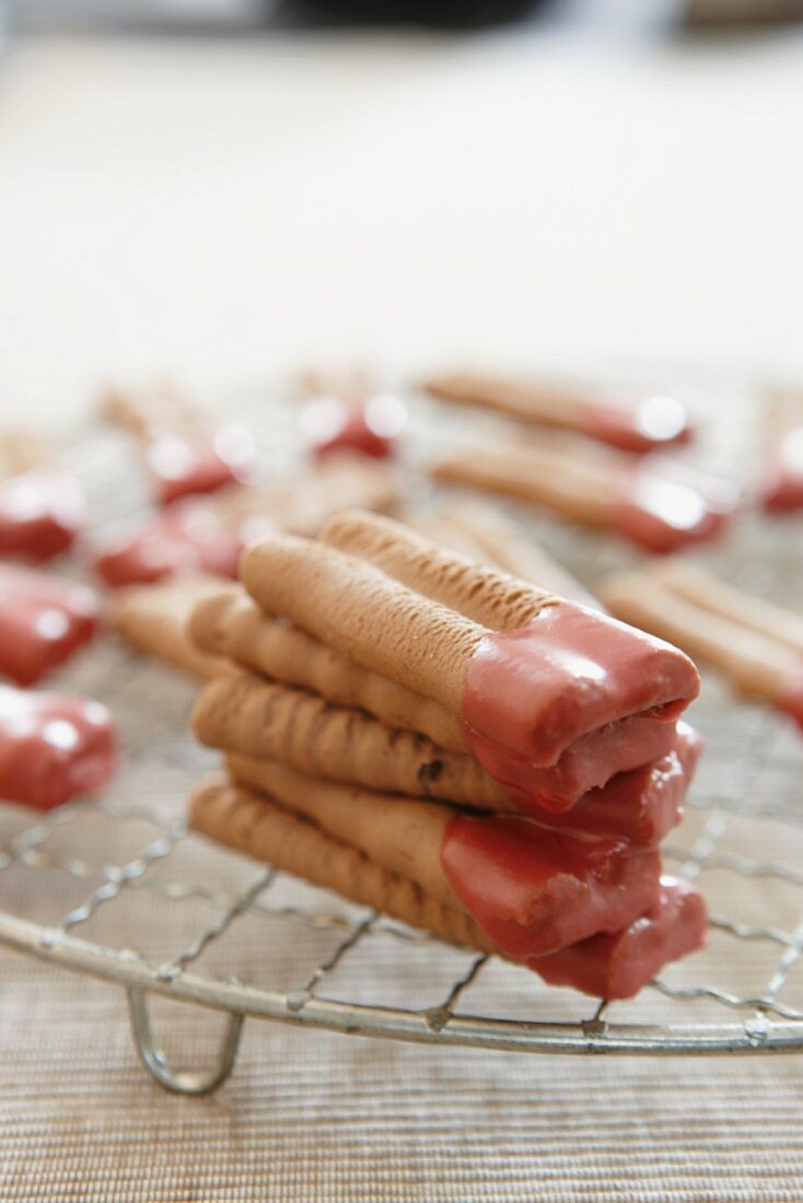 Chocolate tongues with aniseeds and a raspberry glaze