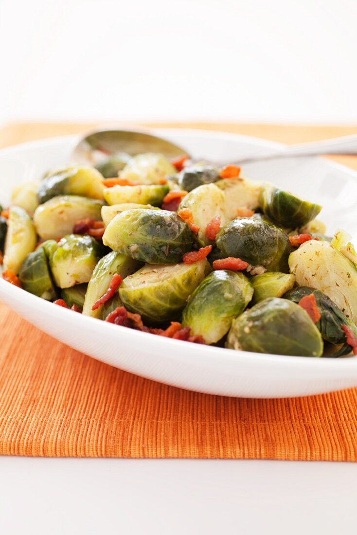 Sauteed Brussels Sprouts with Bacon in a Serving Dish