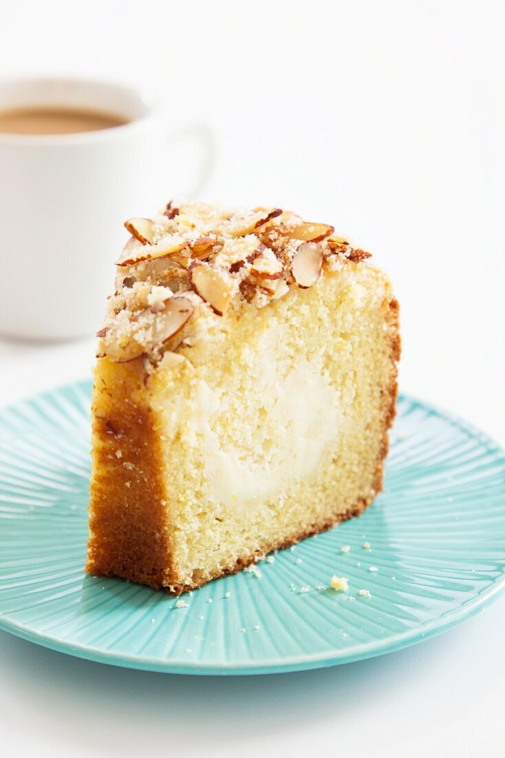 Slice of Almond Coffee Cake; Cup of Coffee