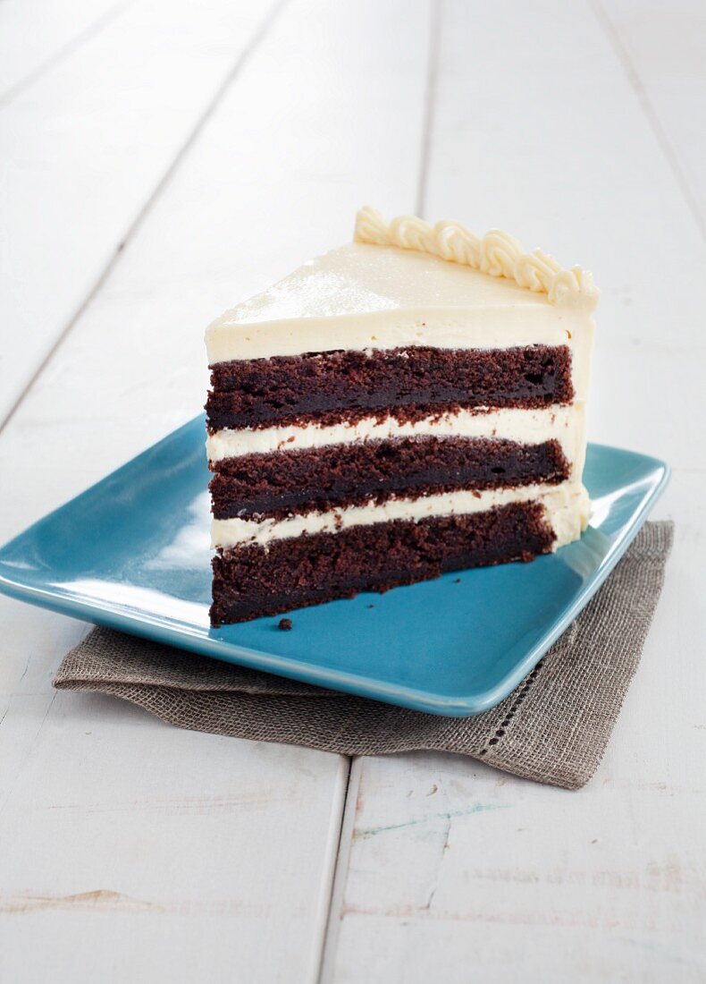 Three Layered Devils Food Cake with Vanilla Frosting
