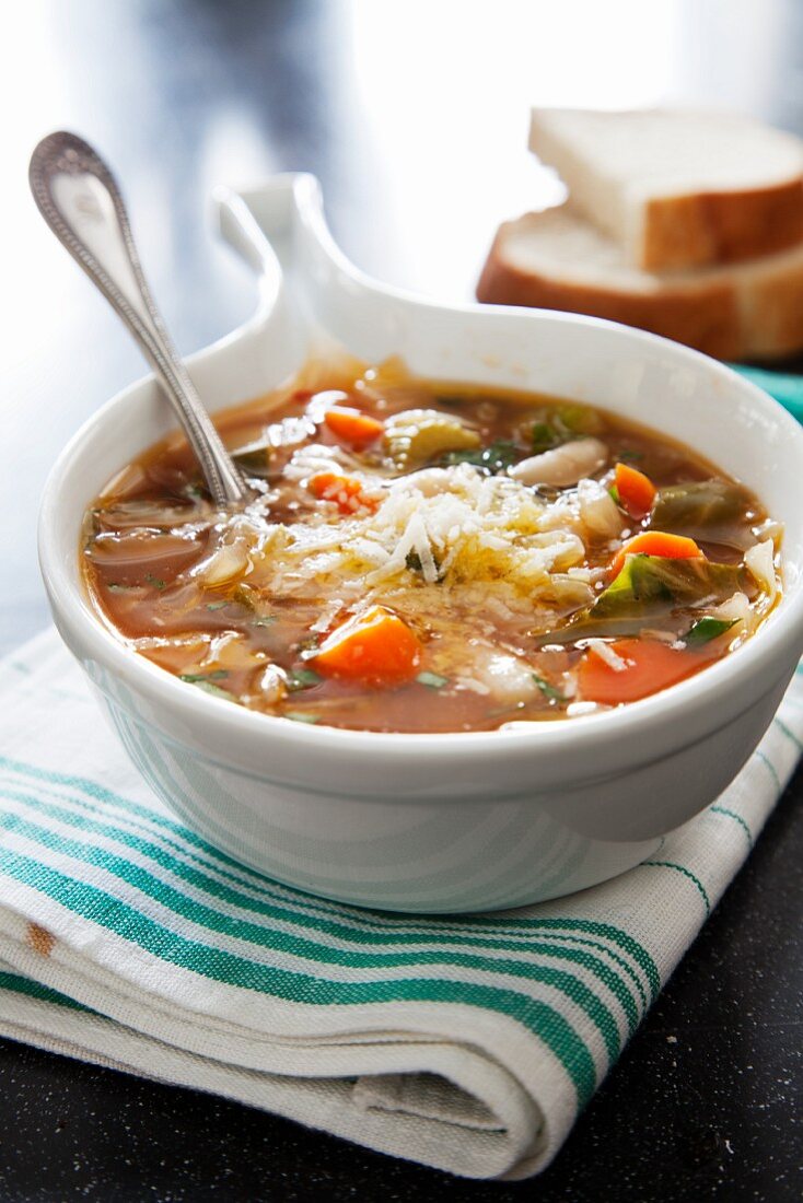 Bowl of Minestrone Soup with Shredded Cheese
