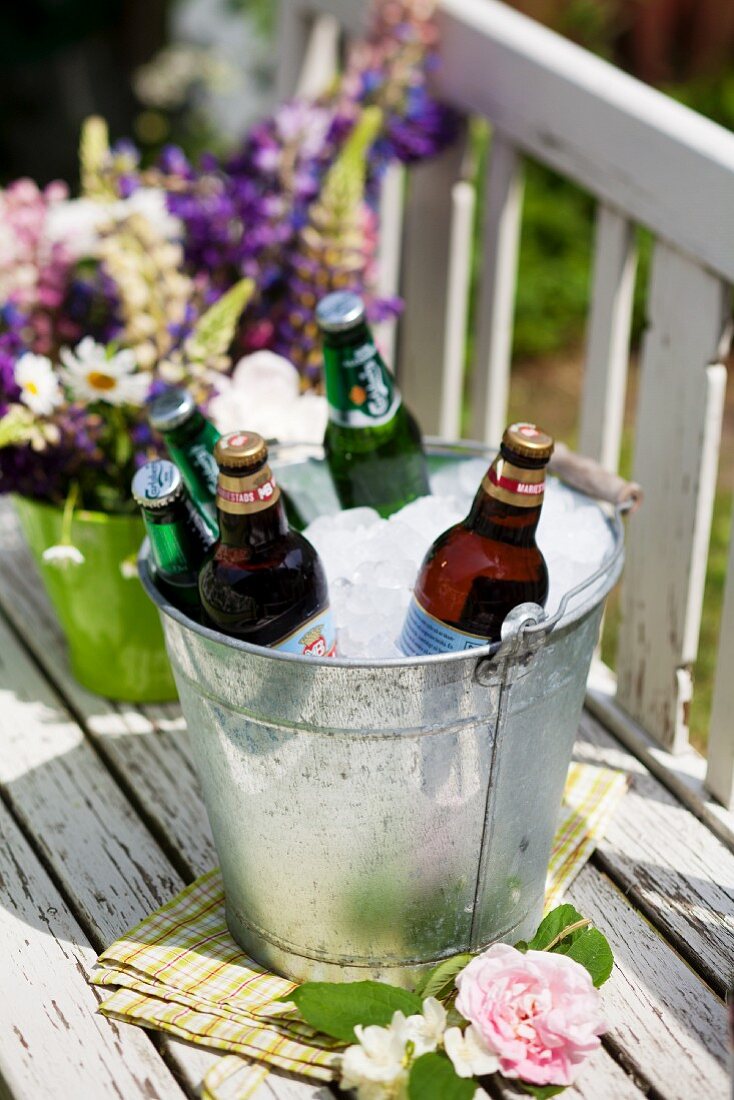 Beer and lemonade in an ice bucket