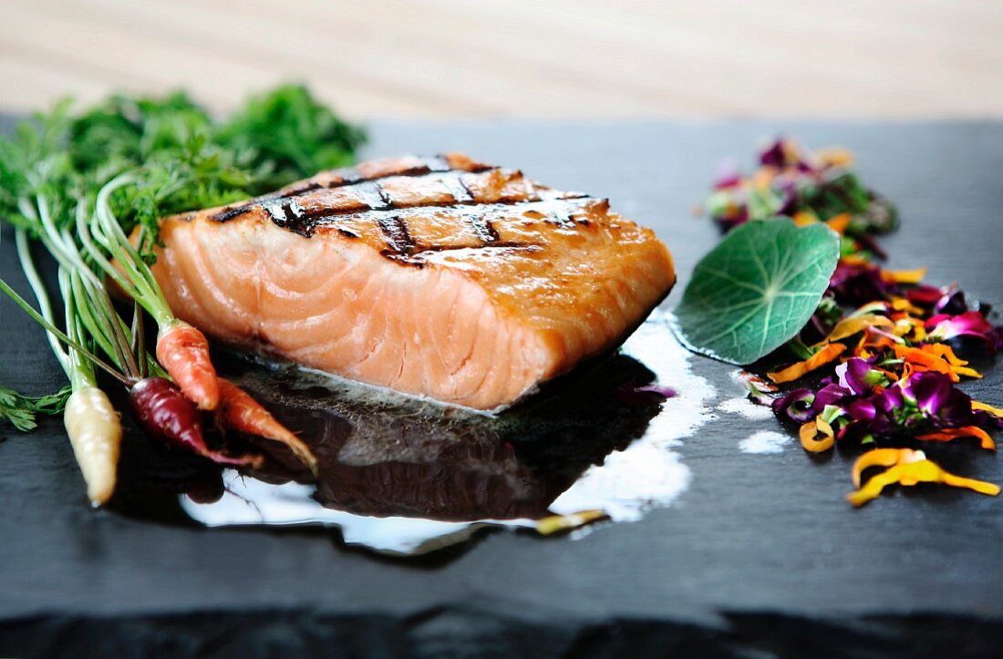 Grilled Salmon with Edible Flowers and Baby Carrots