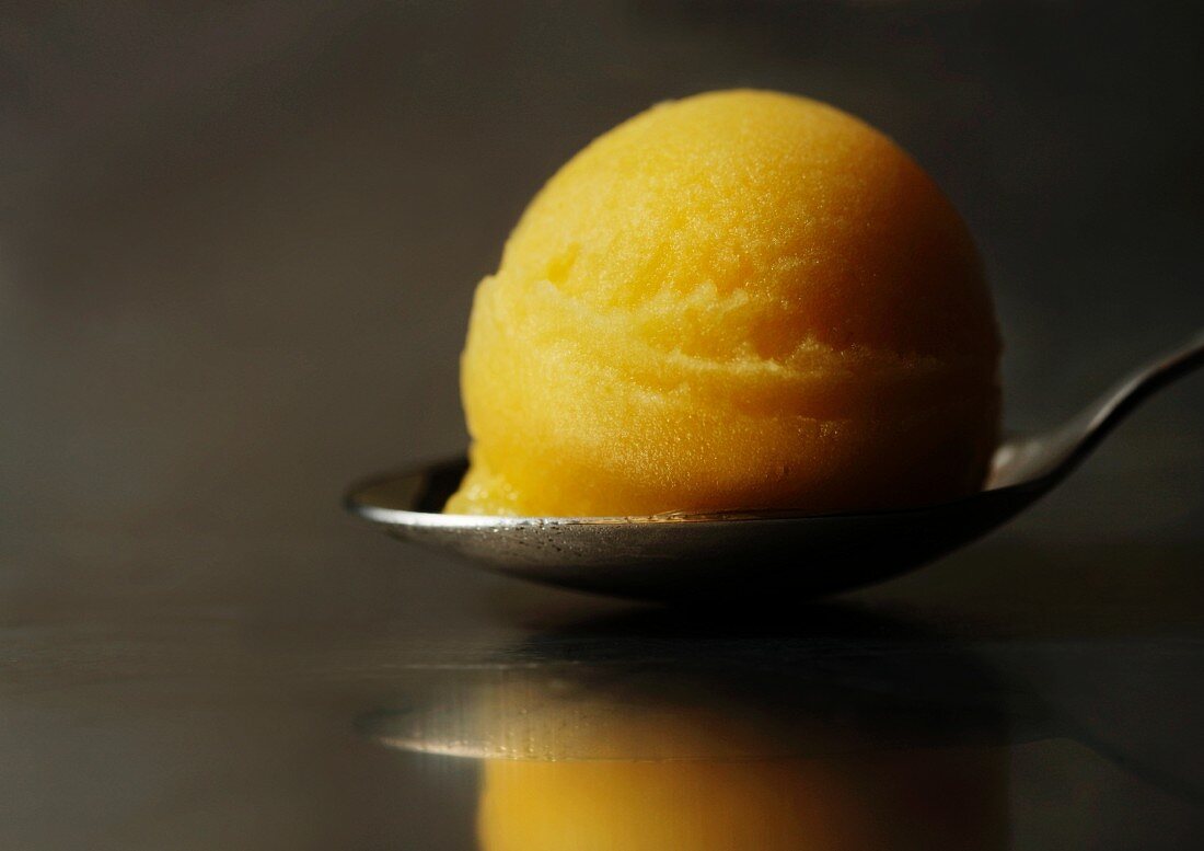 Scoop of Lemon Sorbet on a Spoon