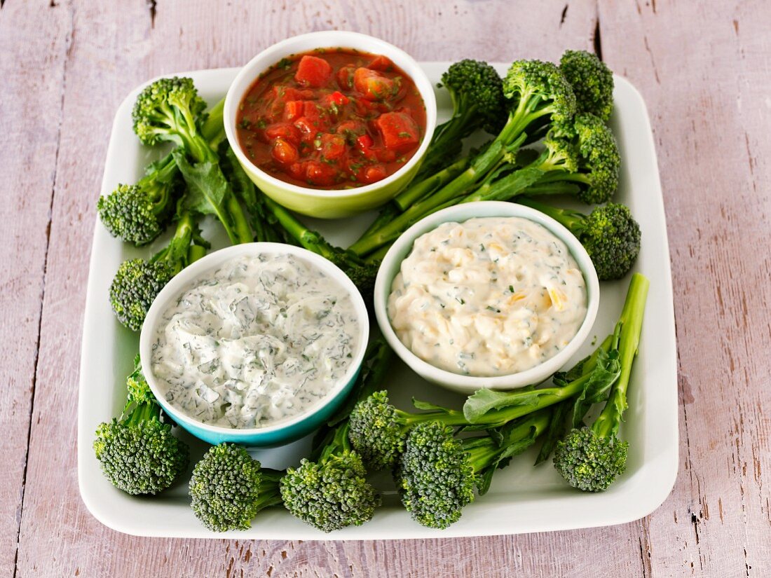 Broccoli and three different dips