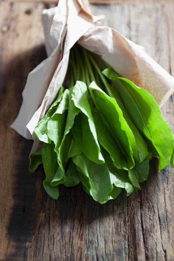 Fresh sorrel wrapped in paper