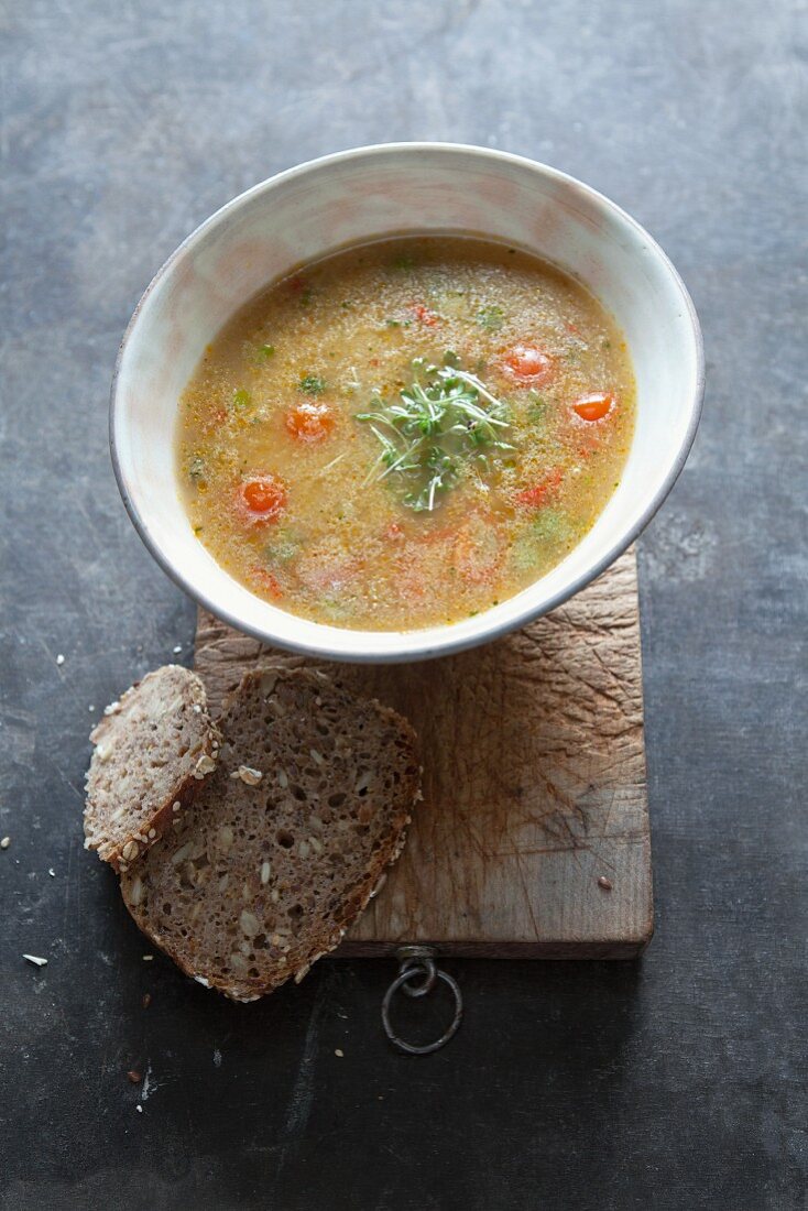 Spicy semolina soup with cress and chilli peppers