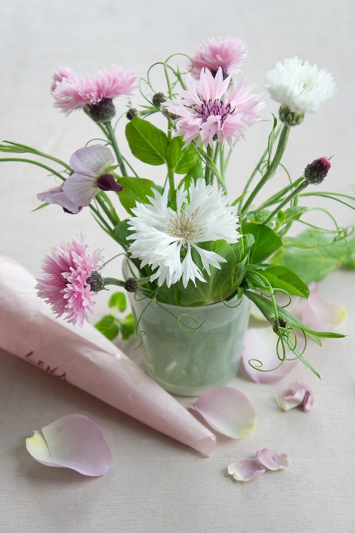 Small bouquet of corn flowers and vetch