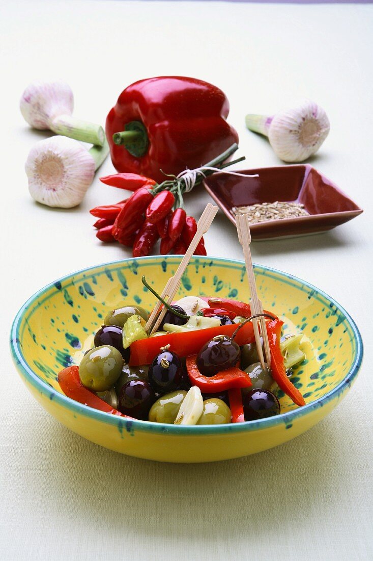 Preserved olives with peppers and almonds