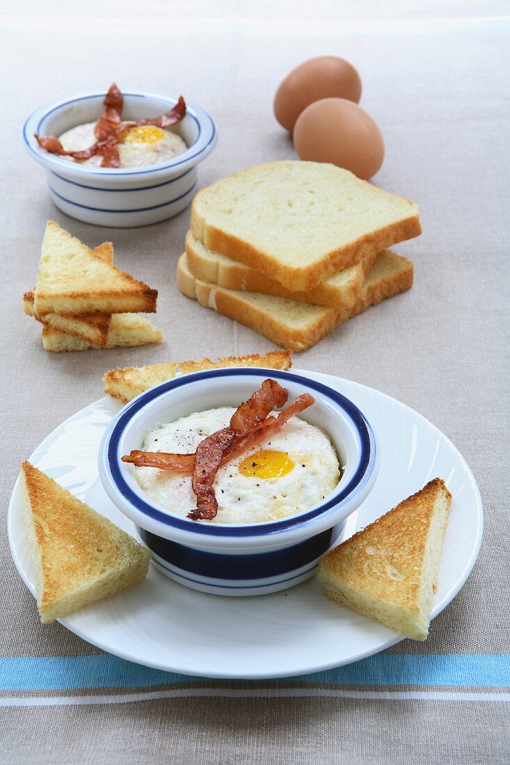 Oeuf cocotte with ham and toast
