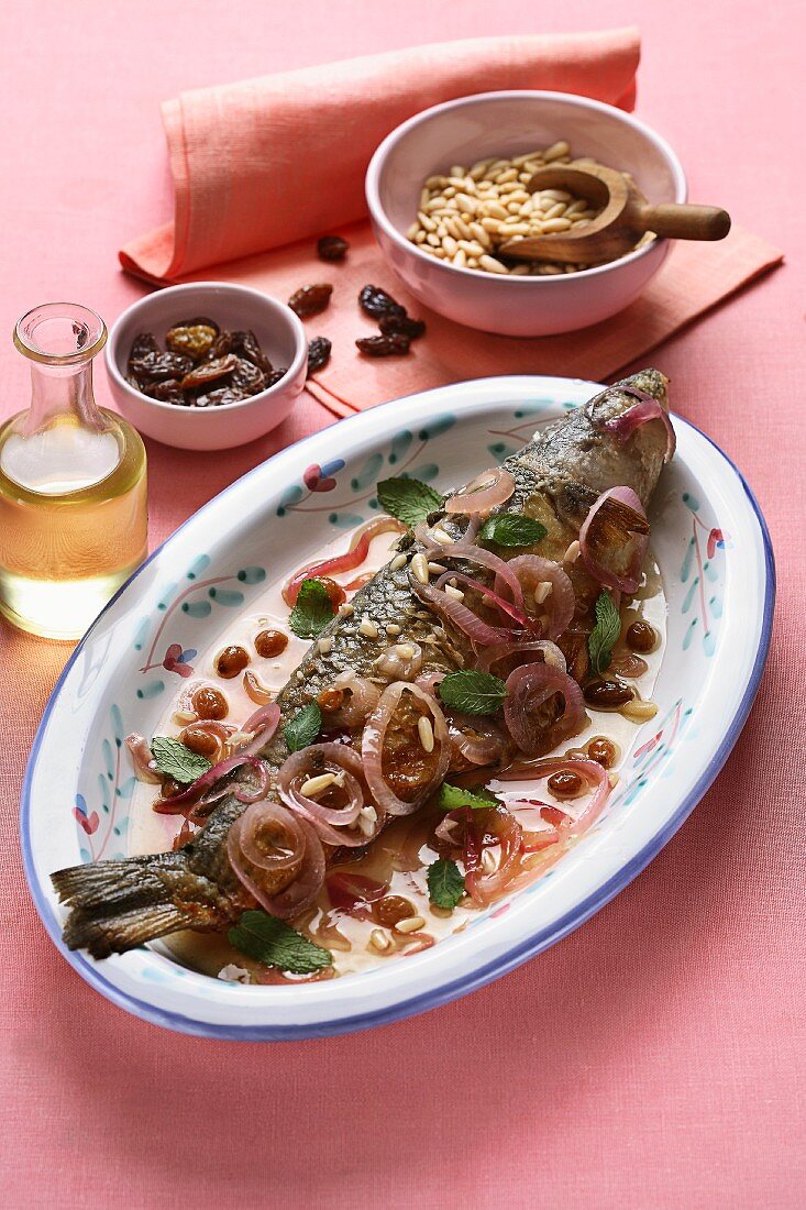 Marinated grey mullet with onions