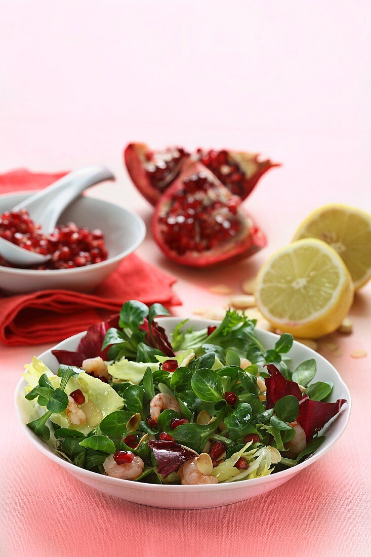 Lamb's lettuce with North Sea shrimps and pomegranate seeds
