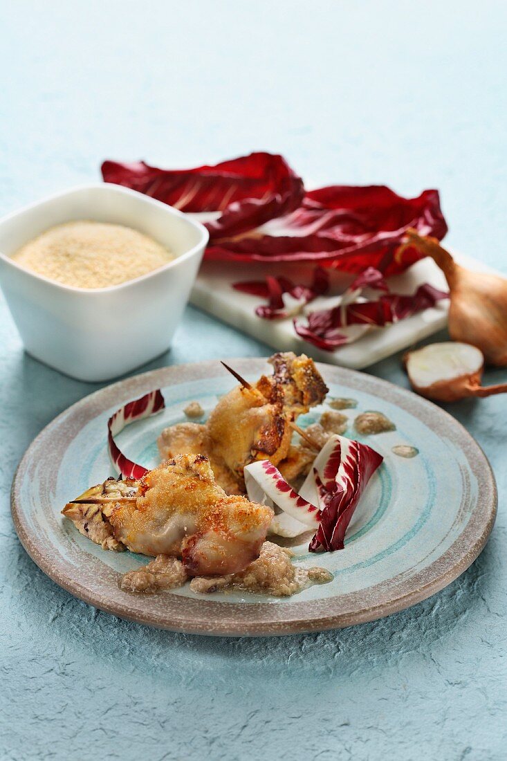 Fried squid filled with buffalo ricotta and radicchio