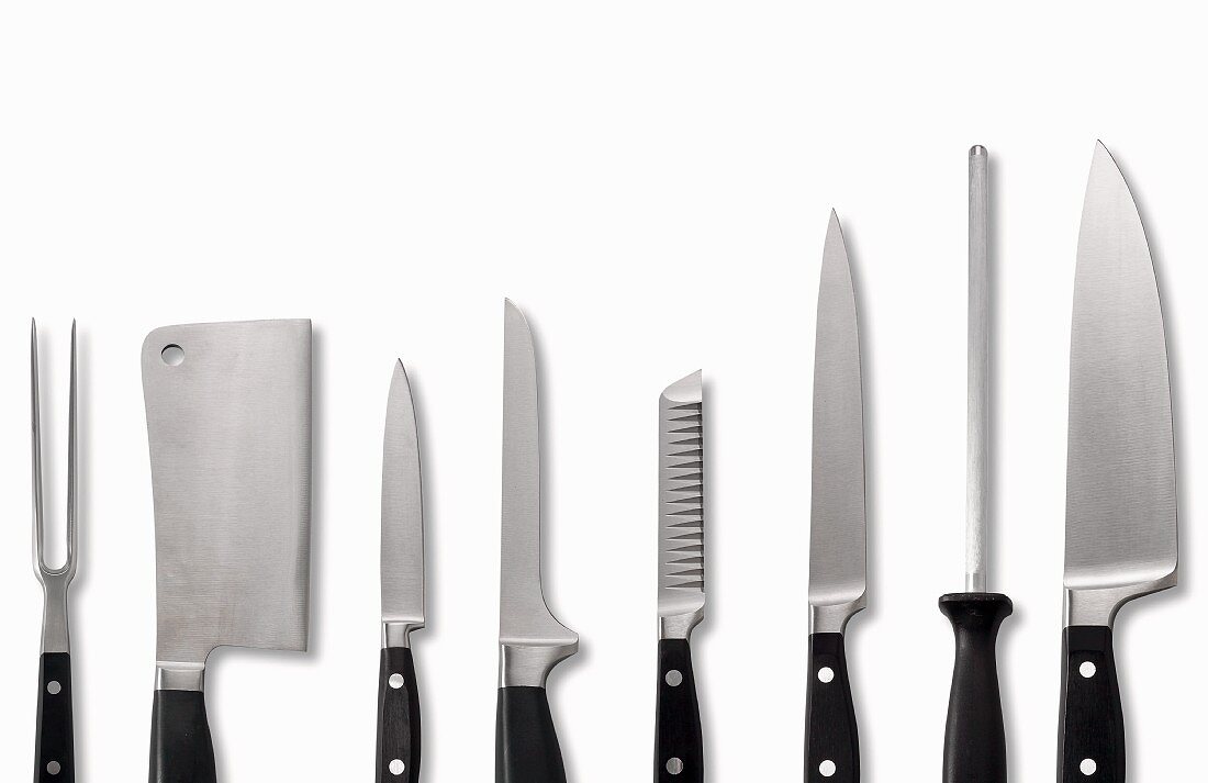 Kitchen tools (meat fork, meat cleaver, various knives and a knife sharpner)