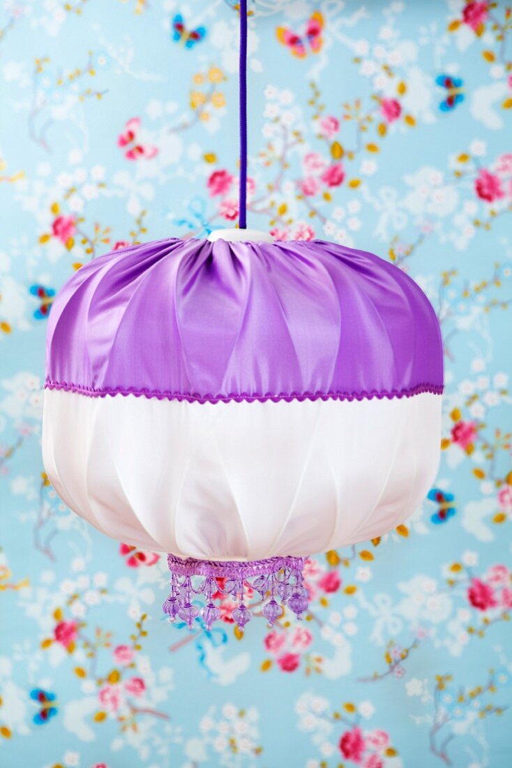 Hand-crafted pendant lamp with purple and white lampshade