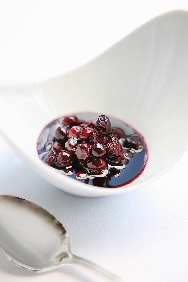 Blueberry Soup in a White Bowl; Spoon