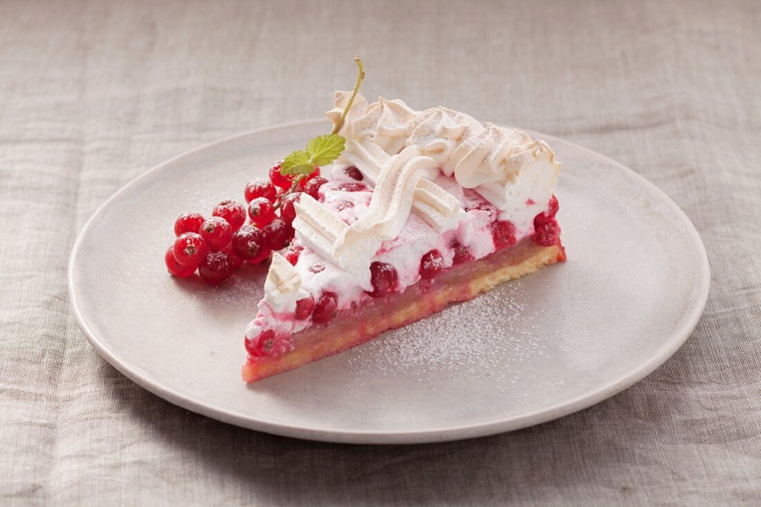 A slice of redcurrant tart with meringue