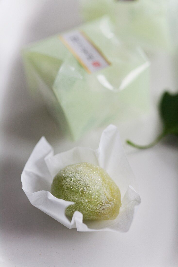 A sugared grape (Japanese sweets) wrapped in paper