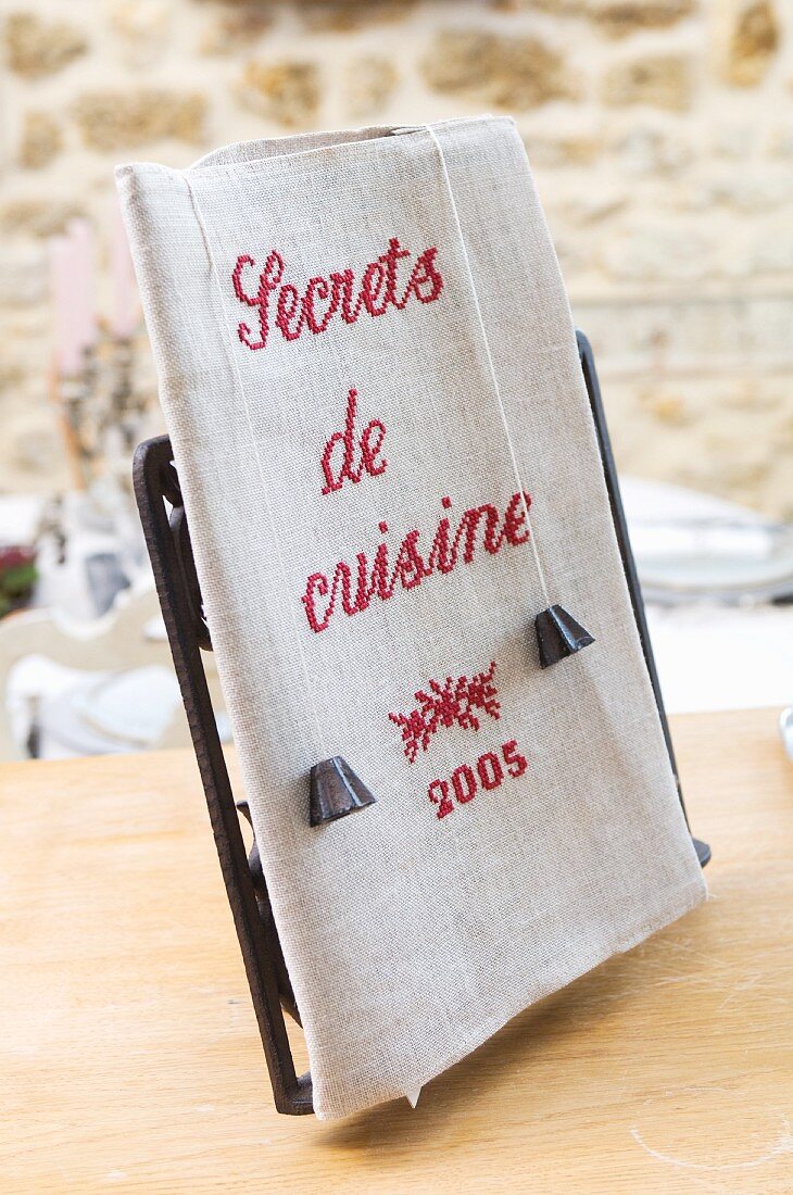 Nostalgic cookery book bound in linen with embroidered title