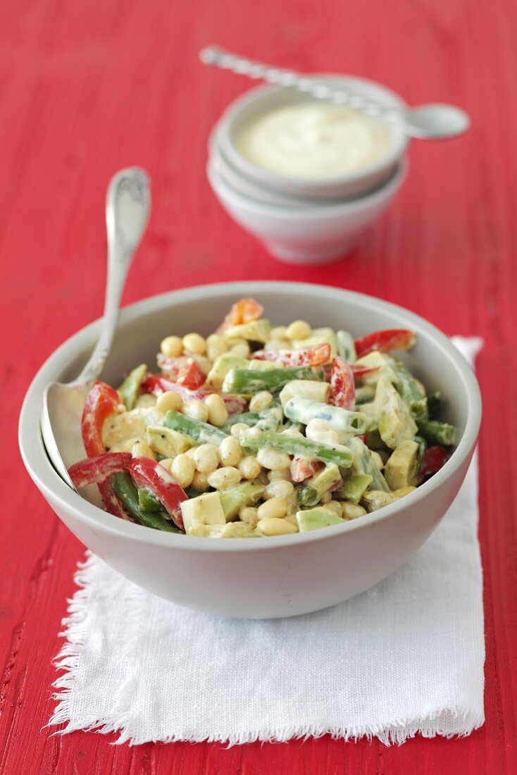 Soy bean salad with green beans, peppers, avocado and yoghurt sauce