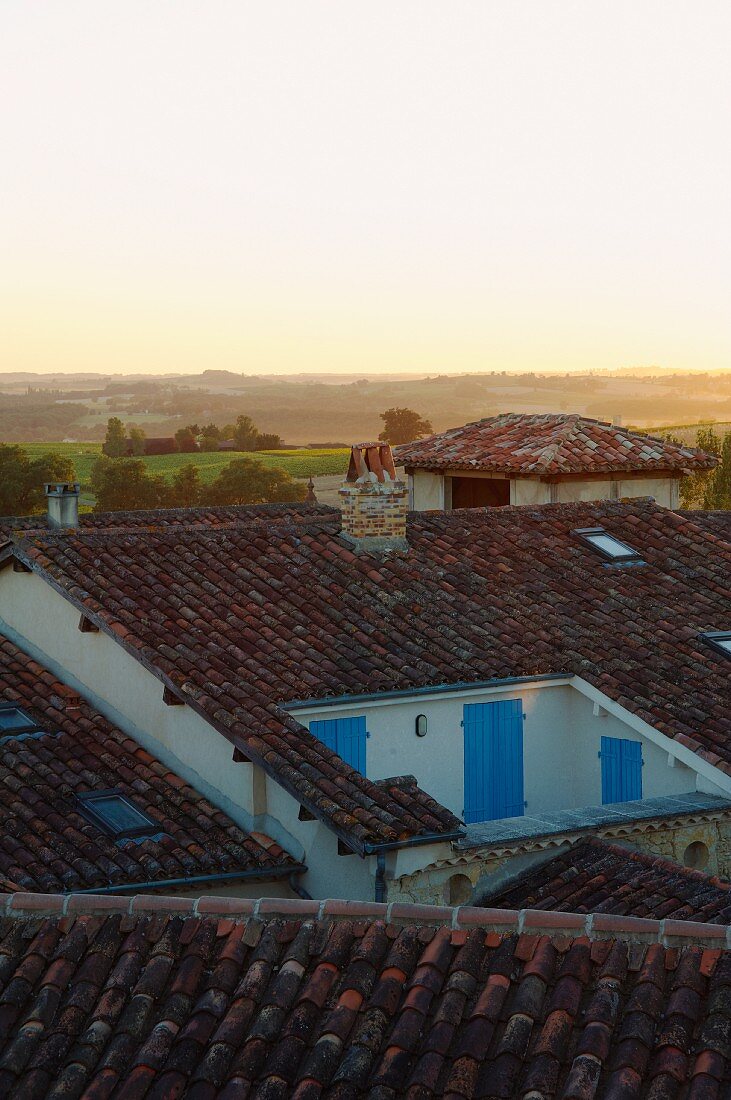 View of horizon across roofs of small French village