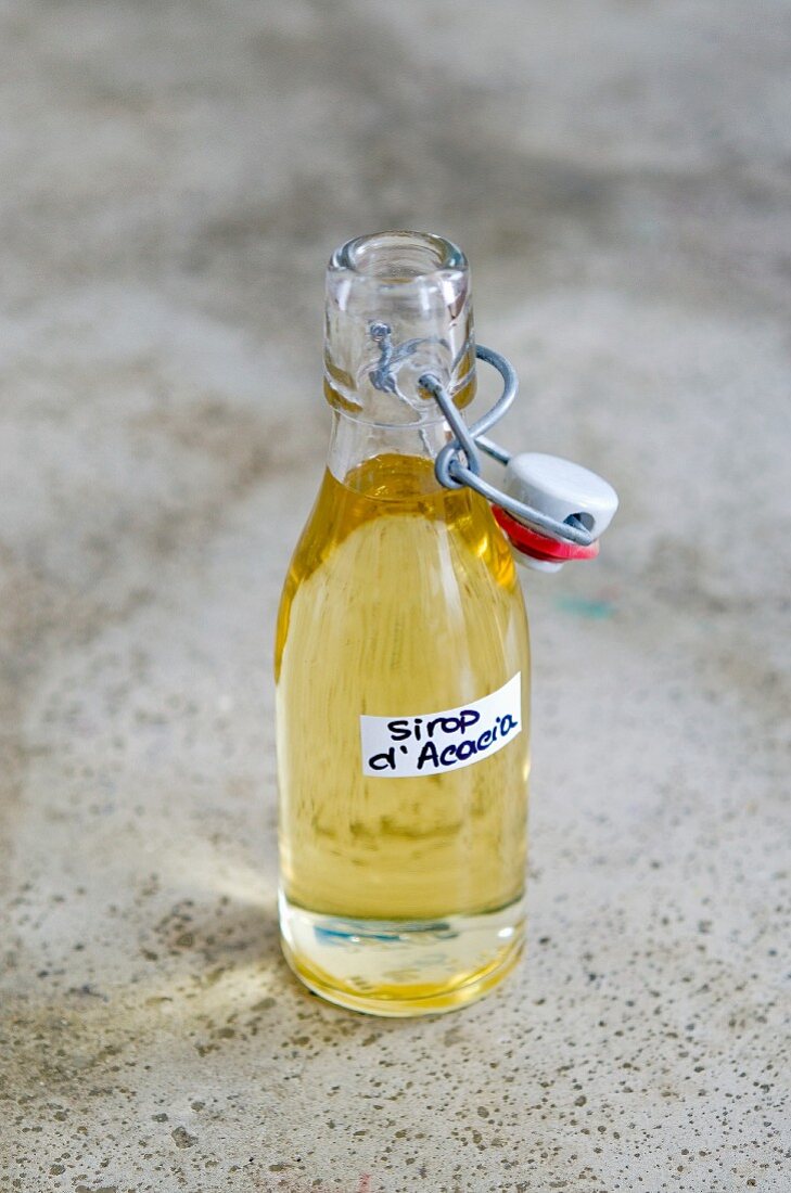 A bottle of homemade acacia syrup