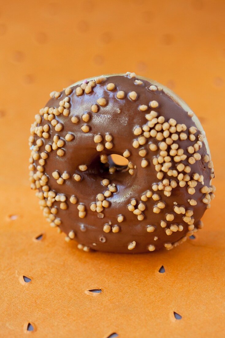A doughnut with chocolate glaze