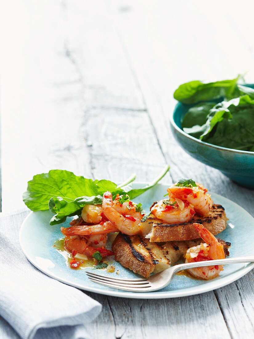 Toasted bread with chilli prawns