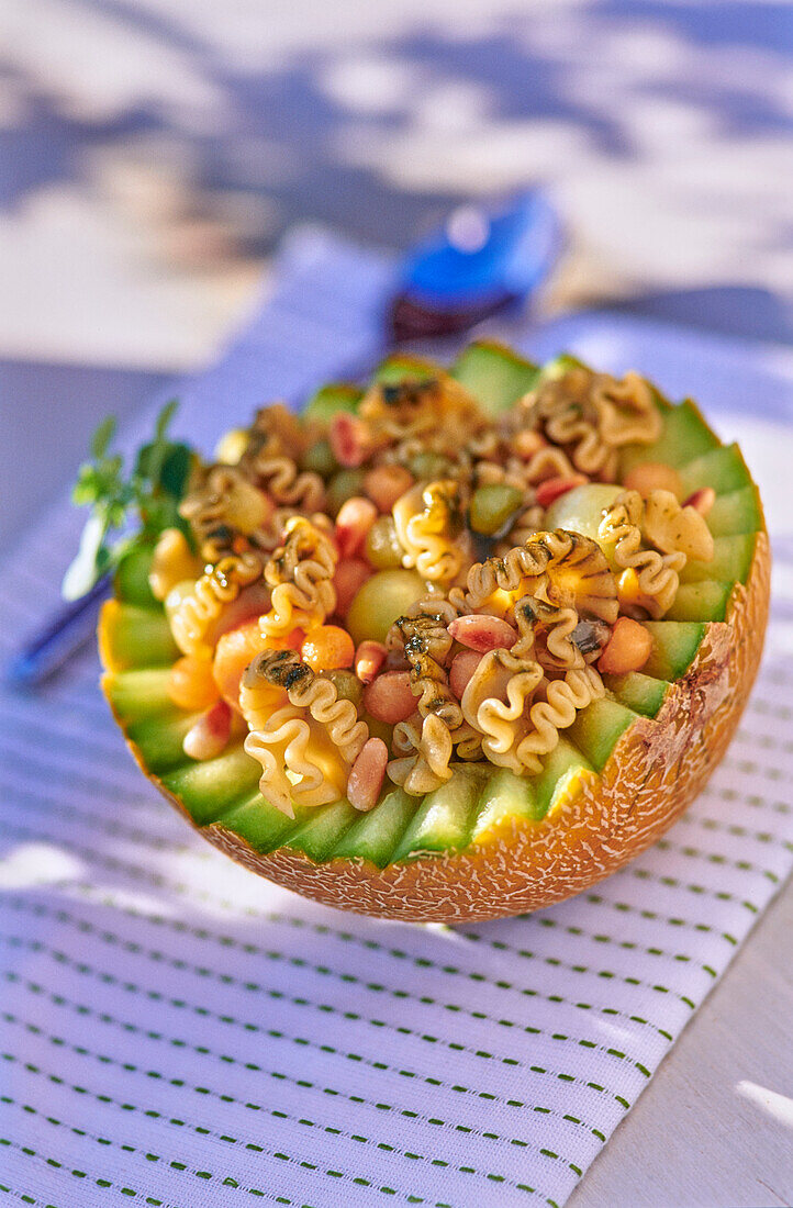 Pasta salad in a hollowed out melon