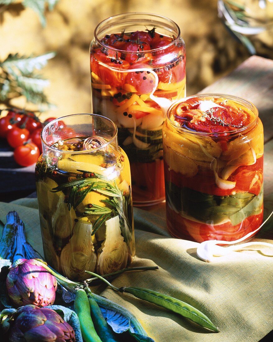 Bottled and pickled vegetables in preserving jars