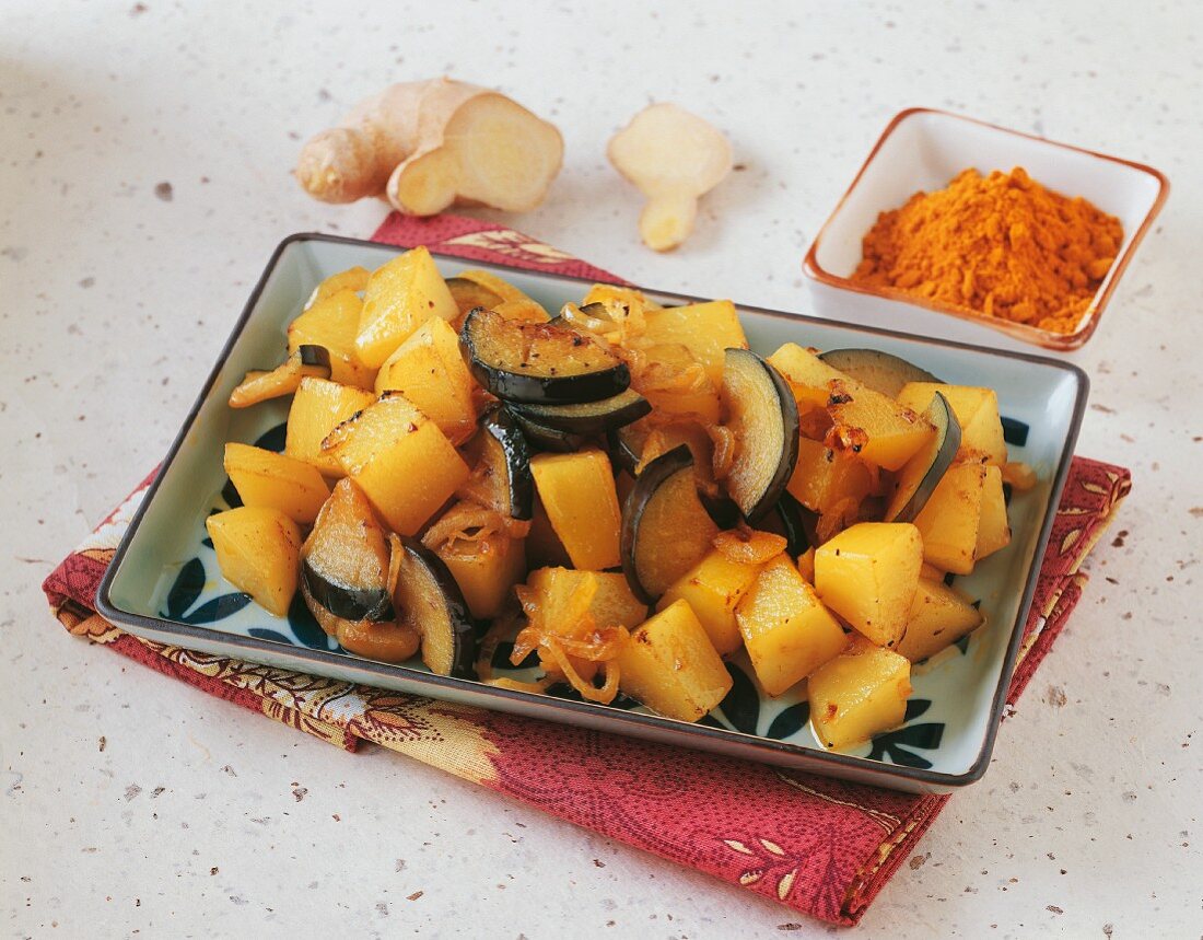 Sweet potatoes and aubergines with curry and ginger (Indonesia)