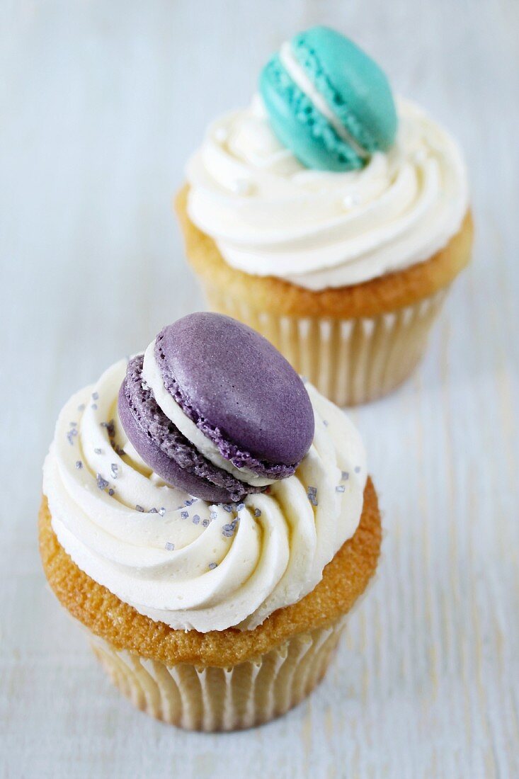 Cupcakes decorated with macarons