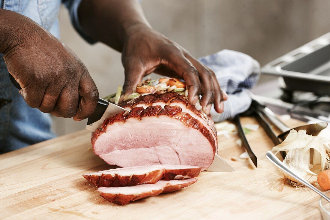 Roast pork being sliced