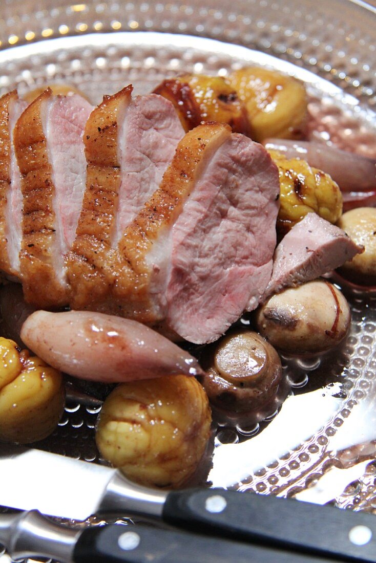 Duck breast with mushrooms, shallots and chestnuts