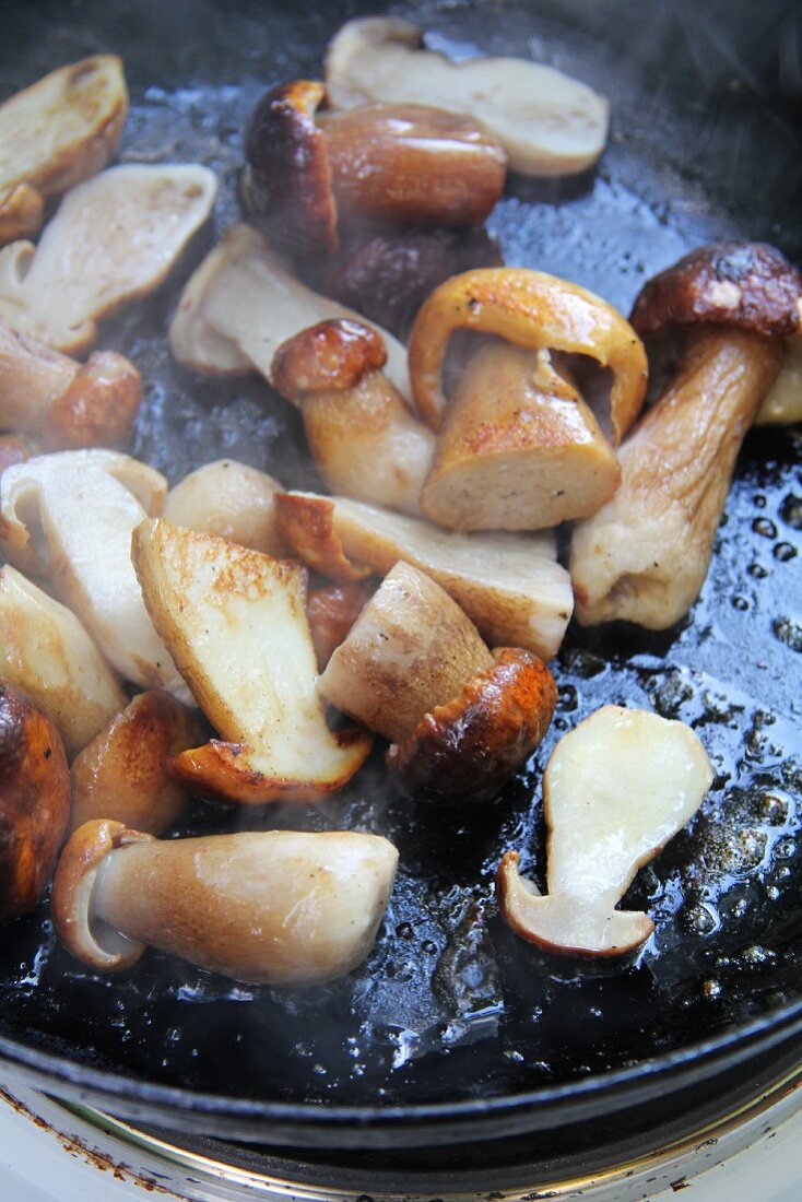 Fried porcini mushrooms in a pan