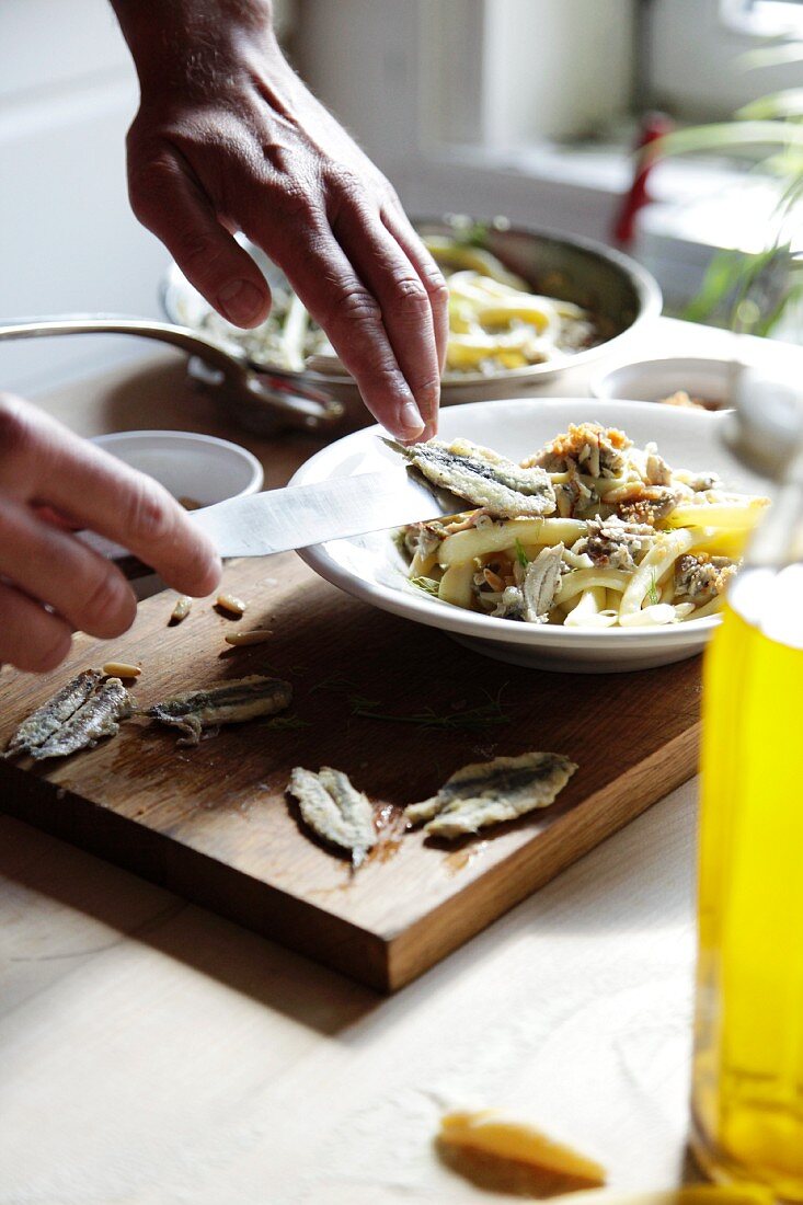 Maccaroni with sardines, fennel, onions and pine nuts