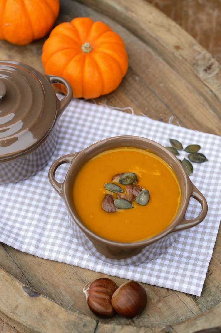 Pumpkin soup with chestnuts and pumpkin seeds