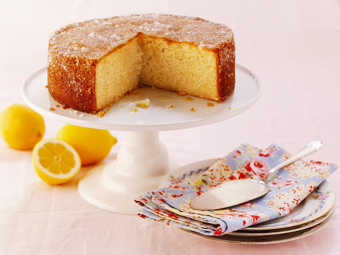 Lemon cake with a piece removed