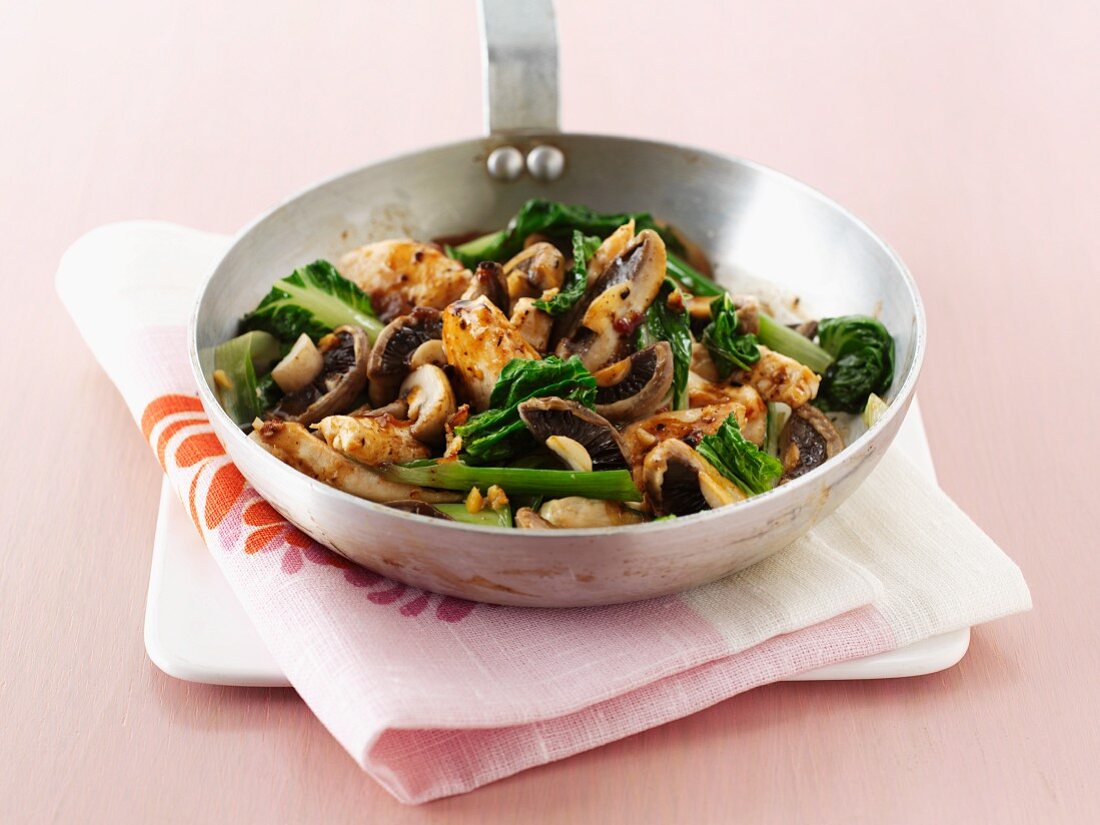 Stir-fried chicken with mushrooms and chard