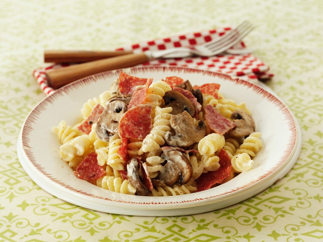 Fusilli with salami and mushrooms