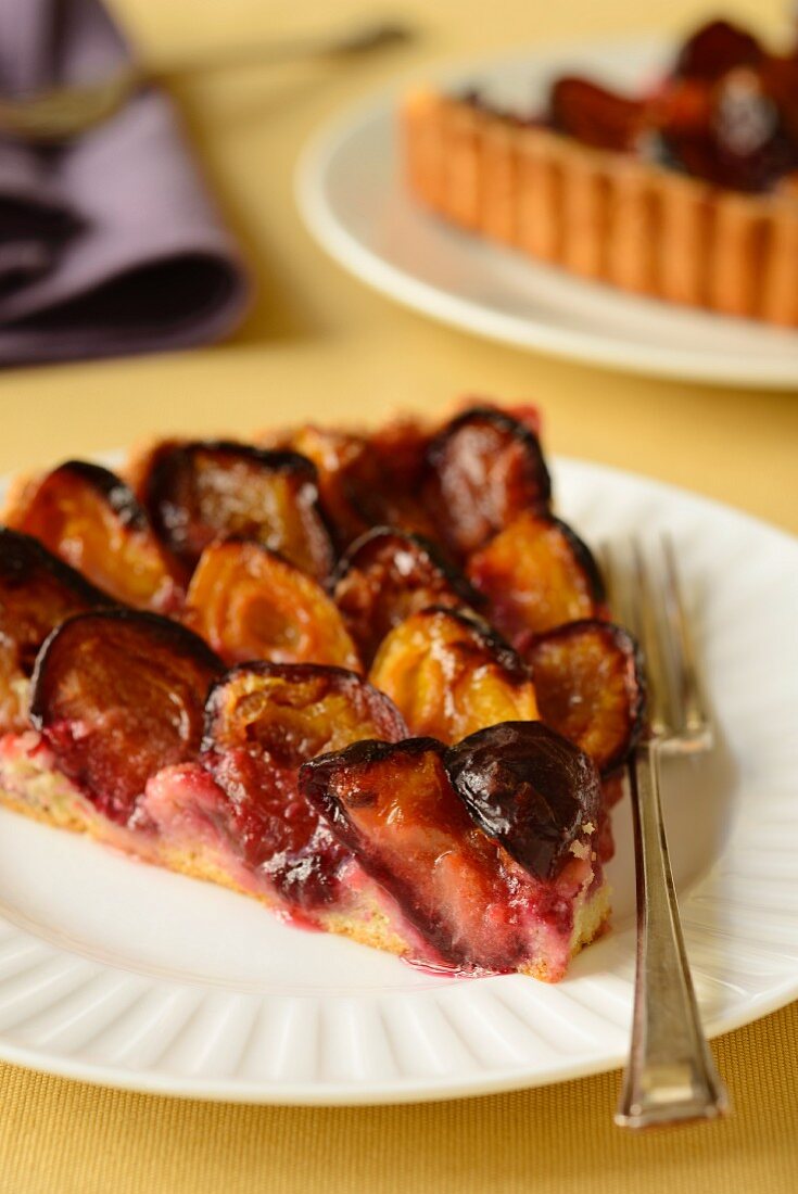 Plum tart made with red and yellow plums