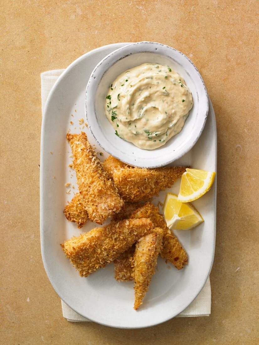 Breaded fish goujons with a dip