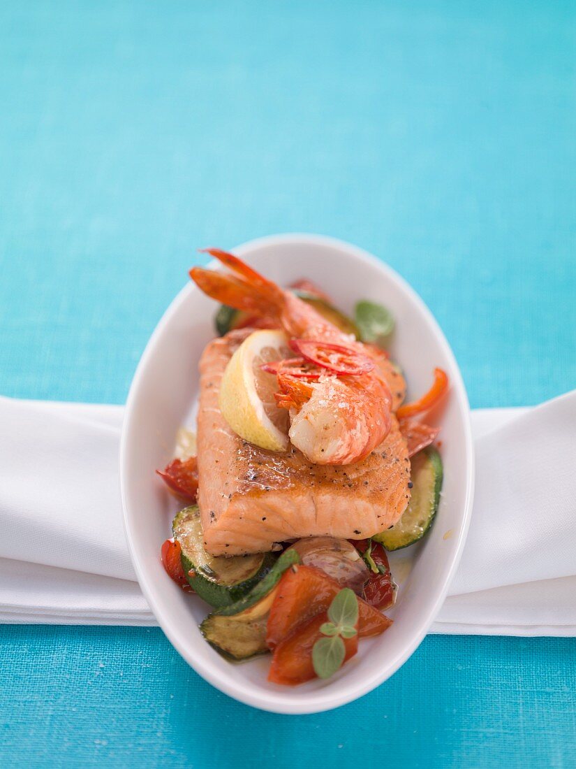 Fried salmon with prawns and vegetables