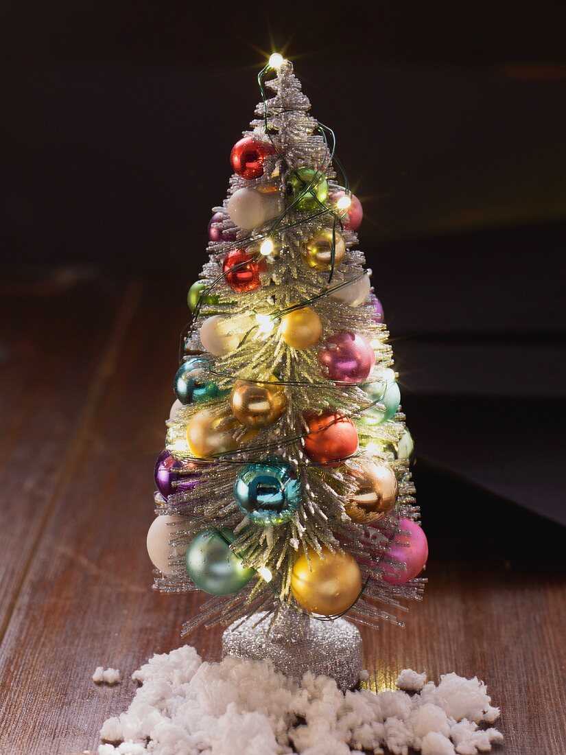 A small artificial decorative Christmas tree