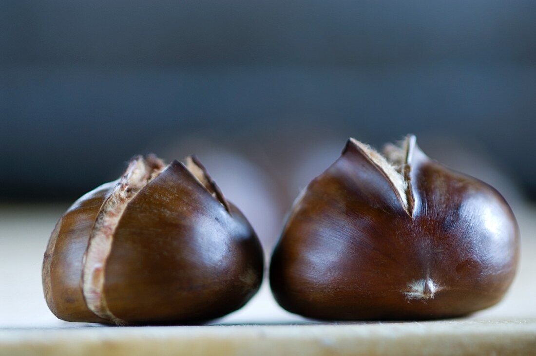 Two roasted chestnuts (close-up)