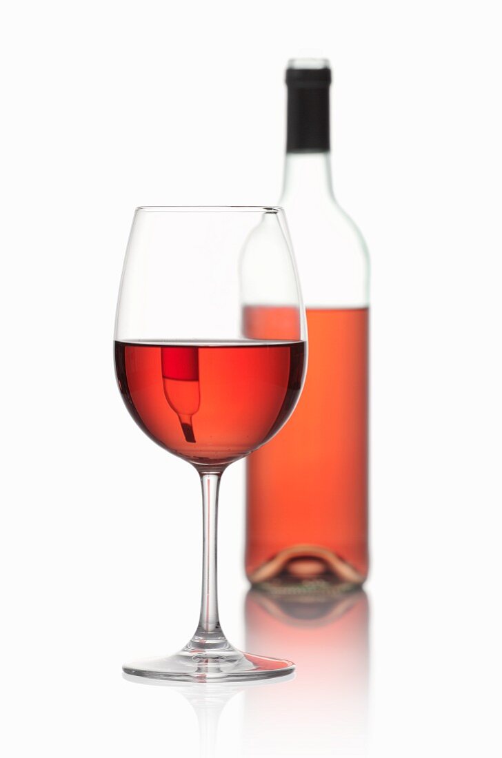 Rose wine in a glass and in a bottle