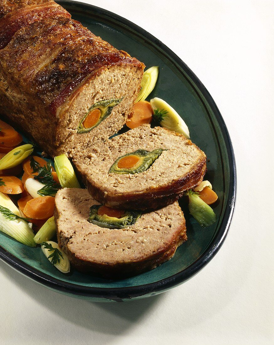 Meatloaf with carrot and leek centre, slices cut