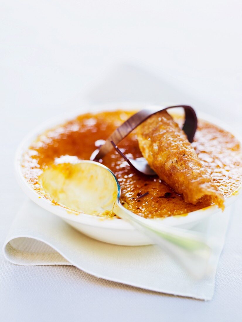 Creme brulee with a spoon