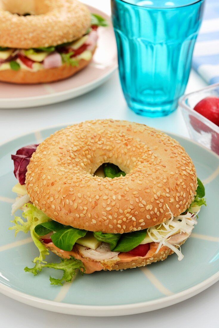 A chicken, lettuce and cheese bagel