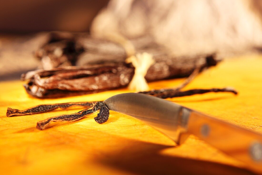 Vanilla pods, whole and opened with vanilla seeds